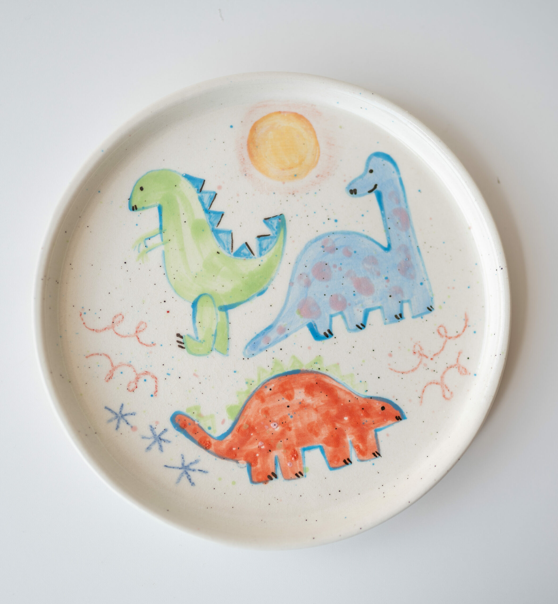 Talerz śniadaniowy w dinozaury 17 cm - obrazek 2